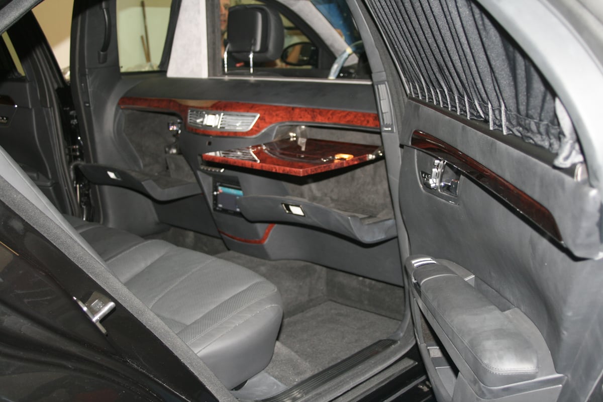Rear compartment with partition wall, folding table and bar built by TRASCO