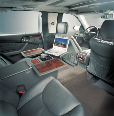 Rear compartment with folding tables and media player, armored limousine based on the Mercedes-Benz S-Class W220