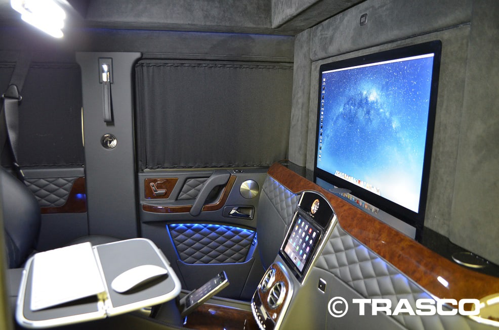TRASCO VIP SUV XXLong based on the Mercedes-Benz G 63 AMG, partition wall with 27-inch monitor and work table