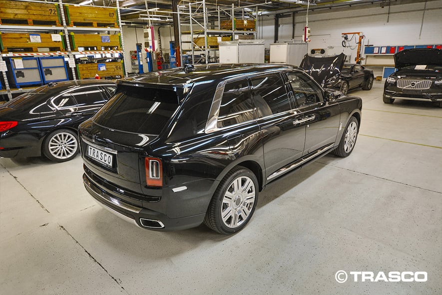 Armored SUV based on the Rolls-Royce Cullinan, rear view in the TRASCO production hall